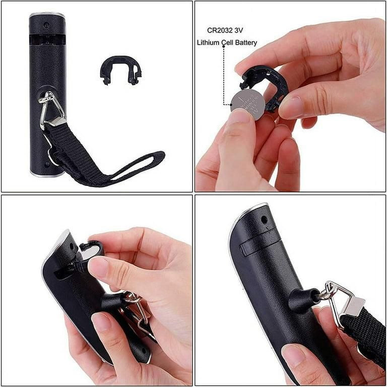 Digital luggage scale in hand with travel suitcase