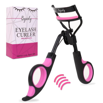 Professional eyelash curler by Byudy — black and pink lever-clamp curler with retail box and four pink silicone replacement pads, precision curl