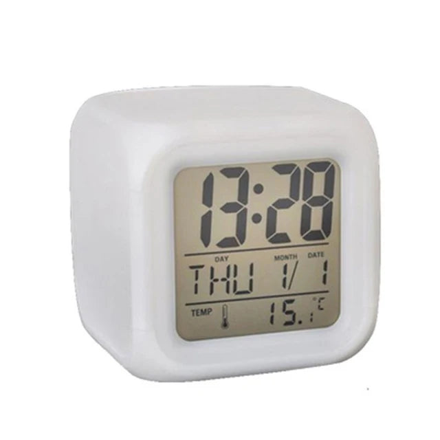 Glowing cube alarm clock product shot with colour-changing LED display