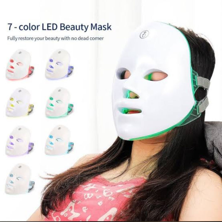Woman wearing the 7-colour LED beauty face mask with all seven LED light modes shown