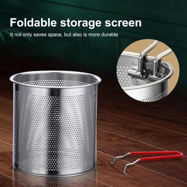 Removable strainer basket with red lift handle — compact storage for the deep fryer pot