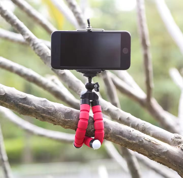 Mini tripod stand in use with a smartphone for photos and video