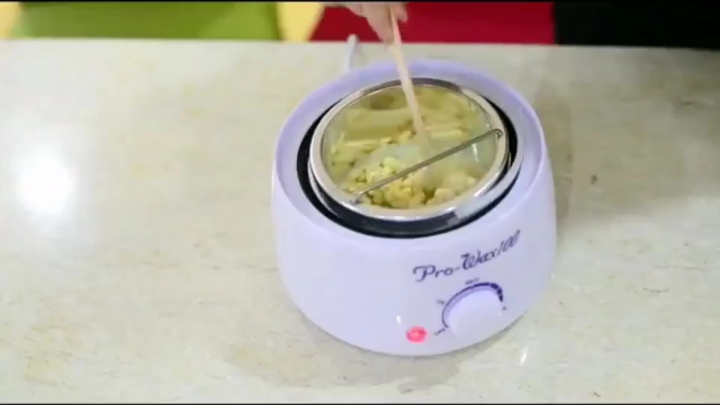 Pro Wax 100 wax heater melting wax in use