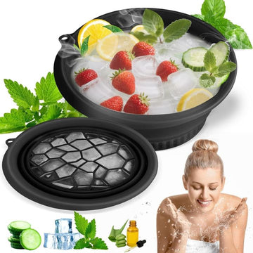 Black foldable silicone ice face bowl filled with ice, strawberries, lemon and cucumber for a DIY ice facial