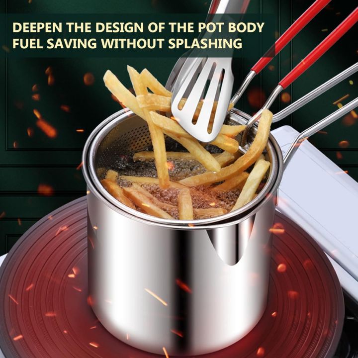 French fries frying in the stainless steel deep fryer pot on an induction cooktop