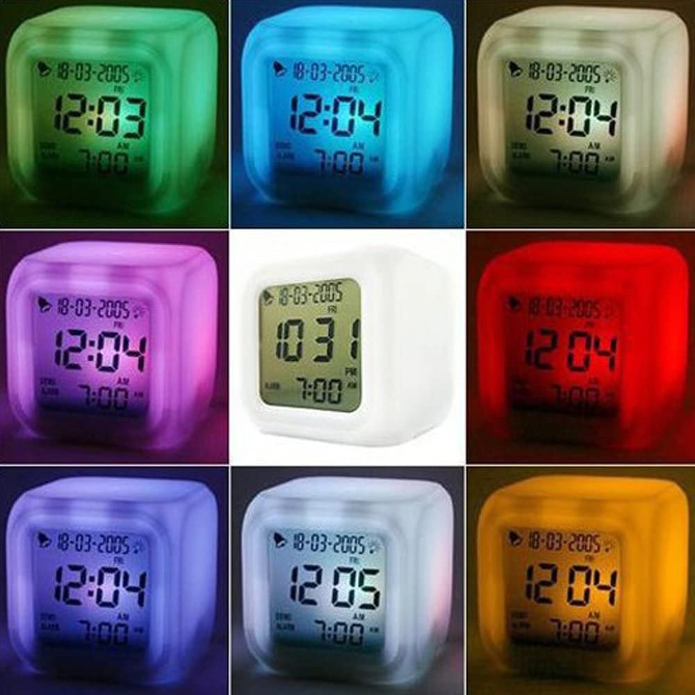 Cube alarm clock in multiple LED colours showing its night-light glow